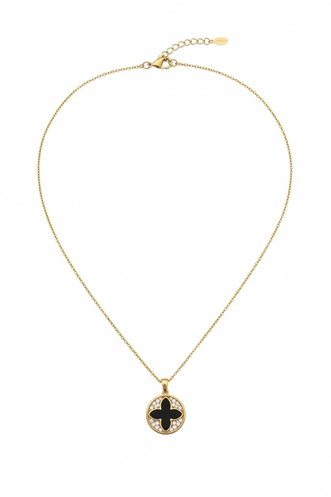 Gold chain necklace with small round clover charm, black center and gold frame