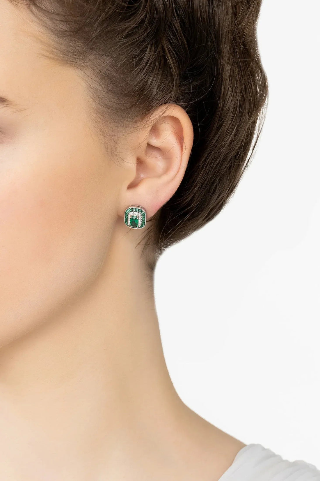 Square emerald green stud earrings on silver-tone posts