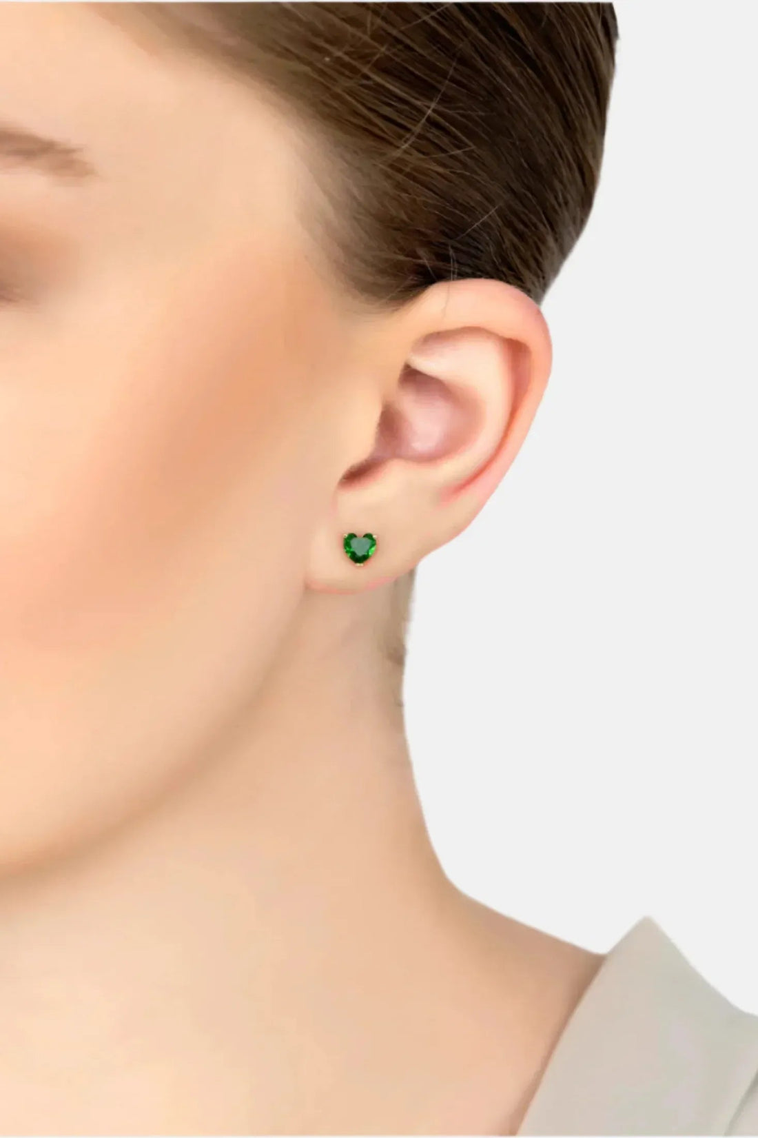 Small heart stud earring with dark green gemstone and gold post