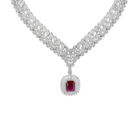 Silver-toned rhinestone statement necklace with ruby-red pendant centerpiece