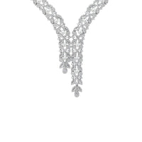 Silver statement necklace with rhinestone V design and dangling charms