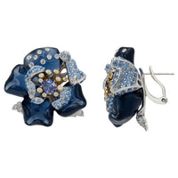 Pair of blue enamel flower stud earrings with gold center and crystal accents