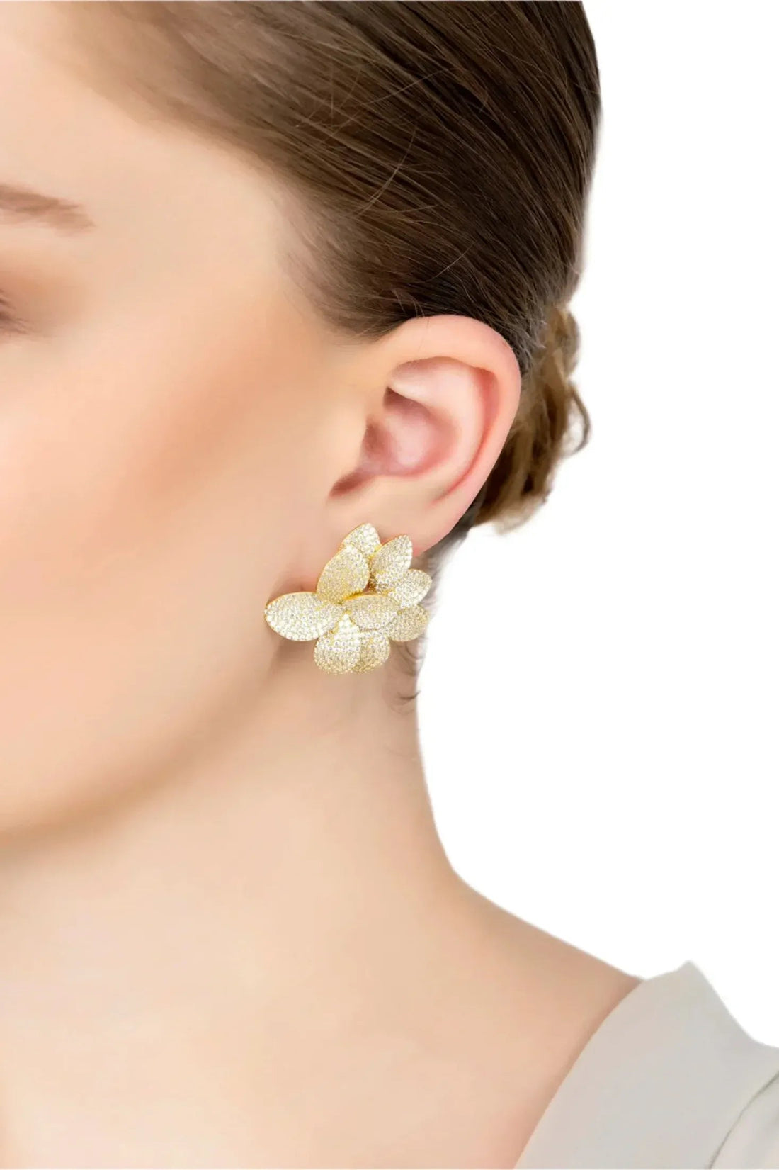 Gold five-petal flower stud earrings, textured sparkle