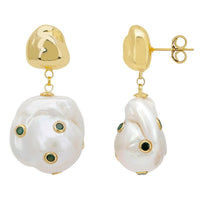Gold baroque pearl drop earrings with green eye-stone accents, front view