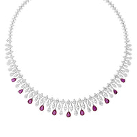Silver statement necklace featuring purple teardrop stones in a continuous row.