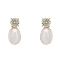 Gold stud earrings with round moissanite top and white teardrop pearl drop