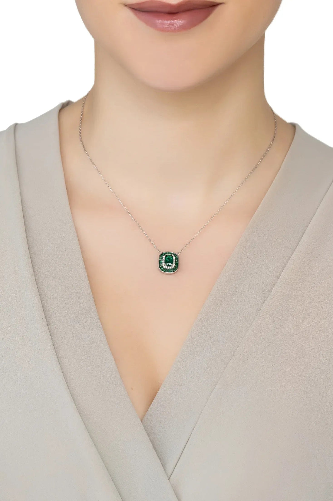 Silver chain pendant necklace with small green square bezel and clear stone frame
