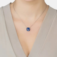 Blue square pendant necklace with small bezel set stone on fine chain