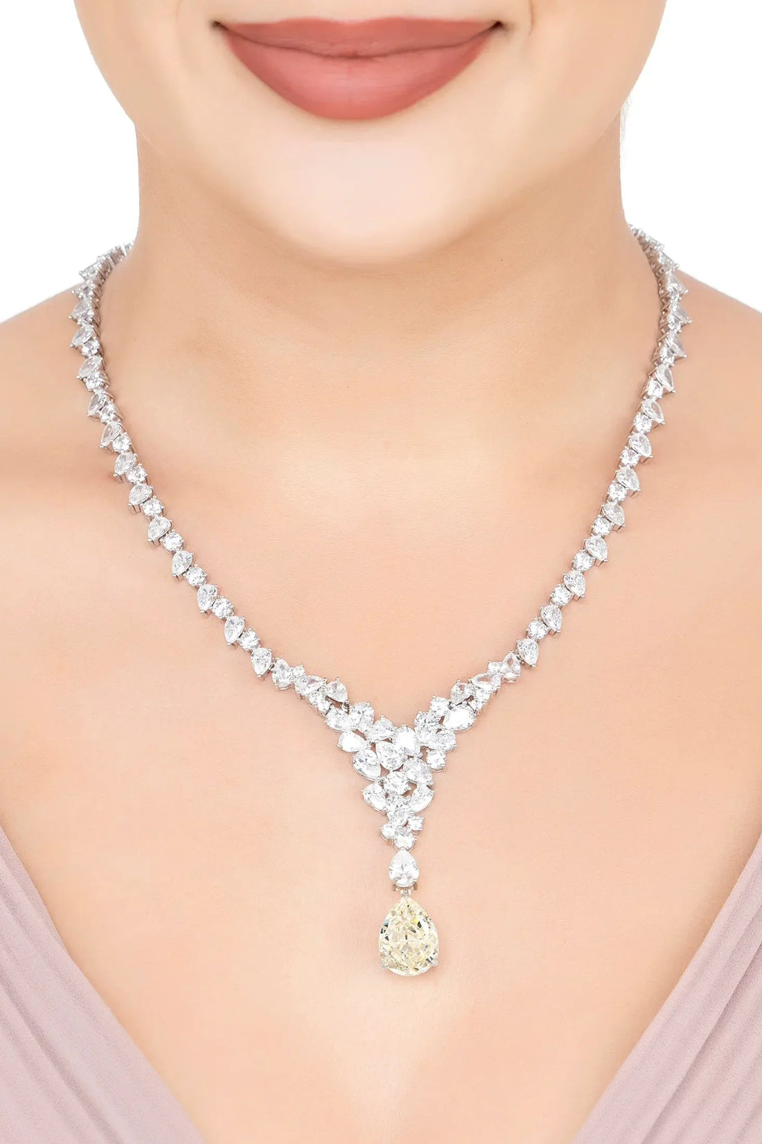 Silver moissanite statement necklace with V-shaped cluster and teardrop pendant