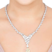 Silver moissanite statement necklace with V-shaped cluster and teardrop pendant