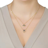 Gold layered hamsa and evil eye pendant necklace, layered chain with blue details