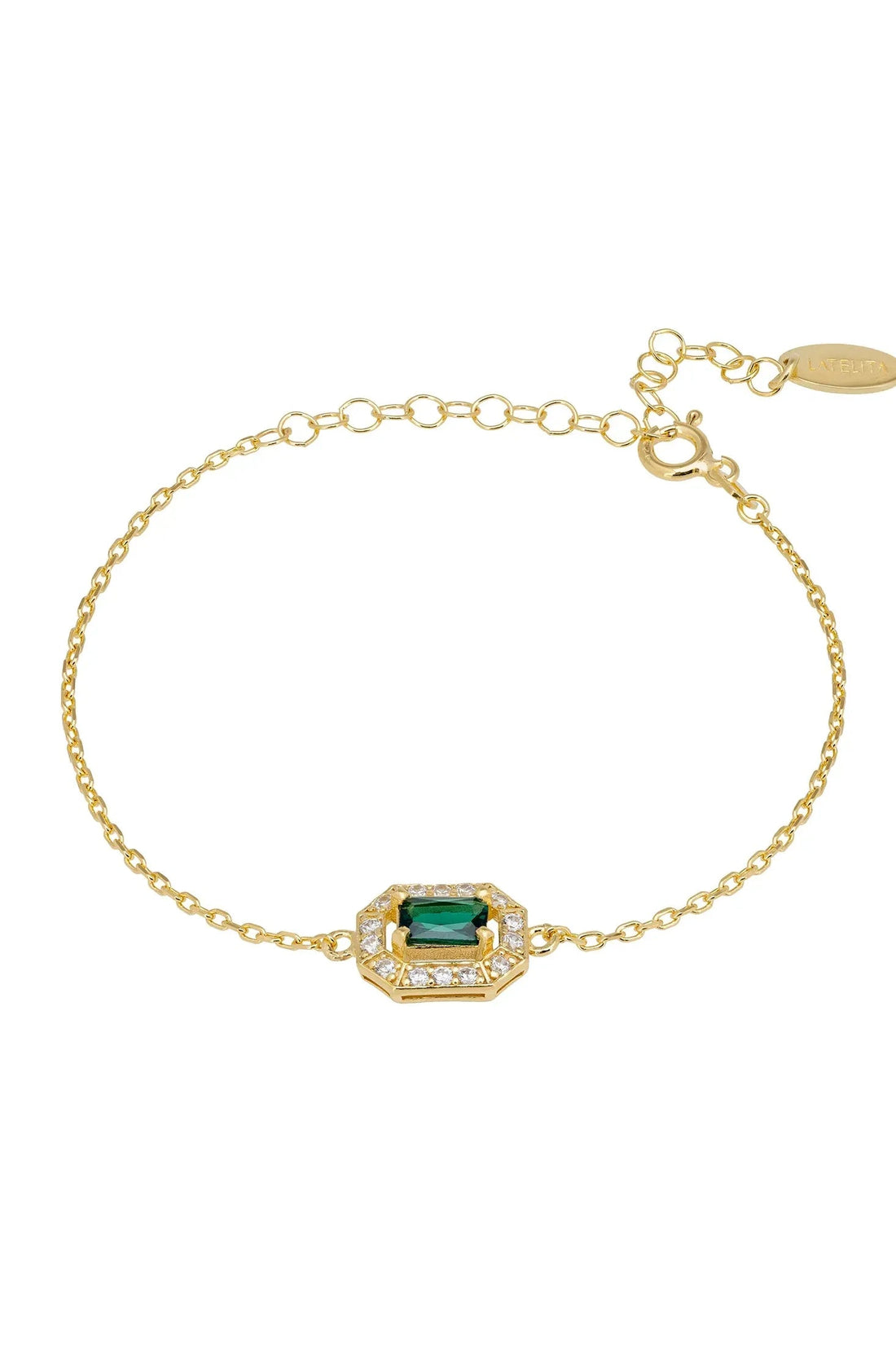 Gold chain gemstone bracelet with emerald green center stone in ornate setting