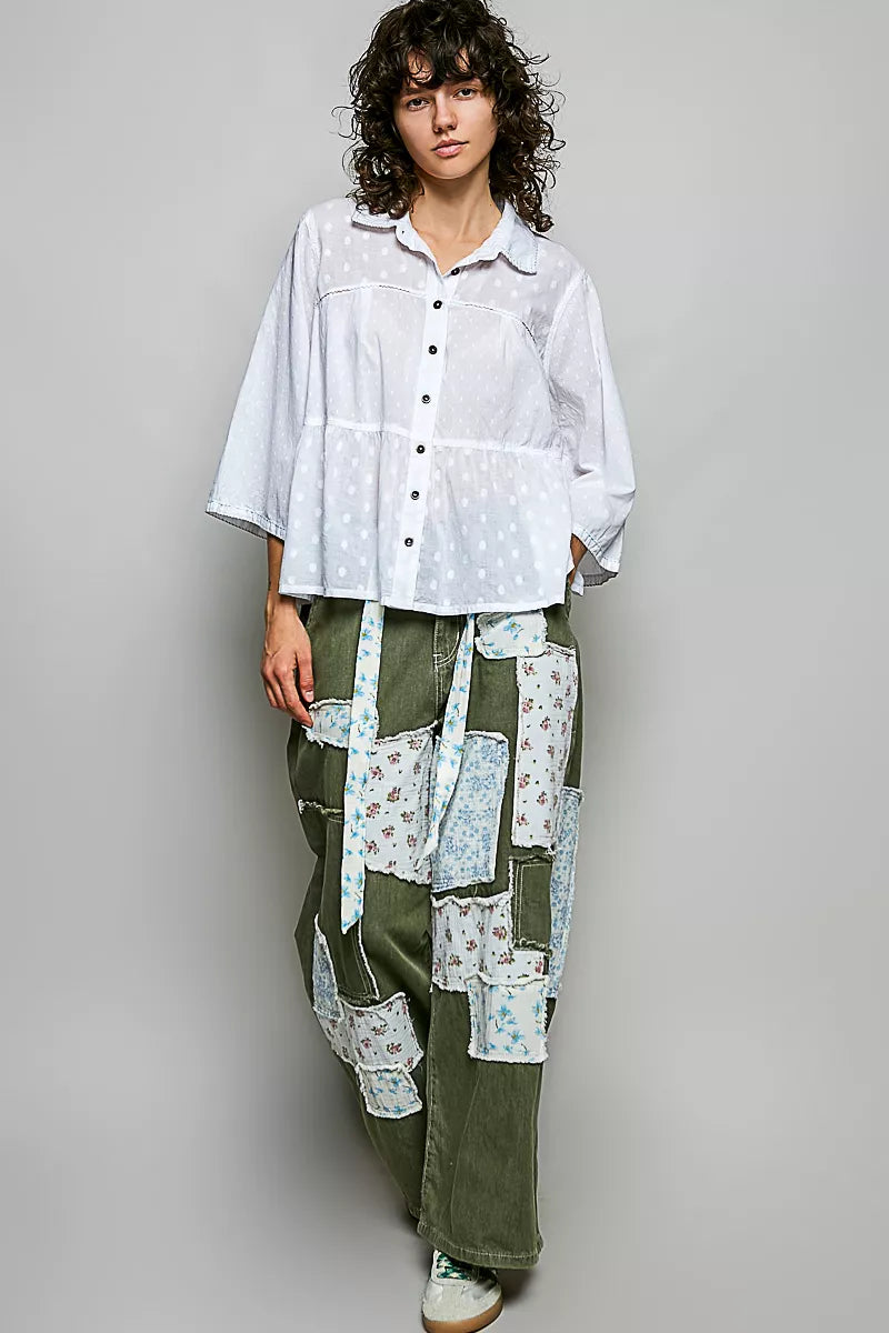 Off-white button-front shirt with short sleeves and tonal dot pattern