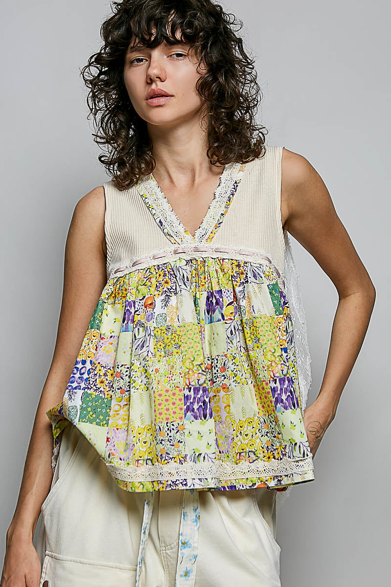 Sheer V-neck lace-trim tank with colorful floral peplum-style hem