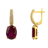 Gold oval drop earrings with ruby red gemstone and pavé hoop