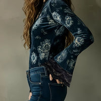 Dark blue patterned blouse with lace-trim flare sleeves and scalloped hem