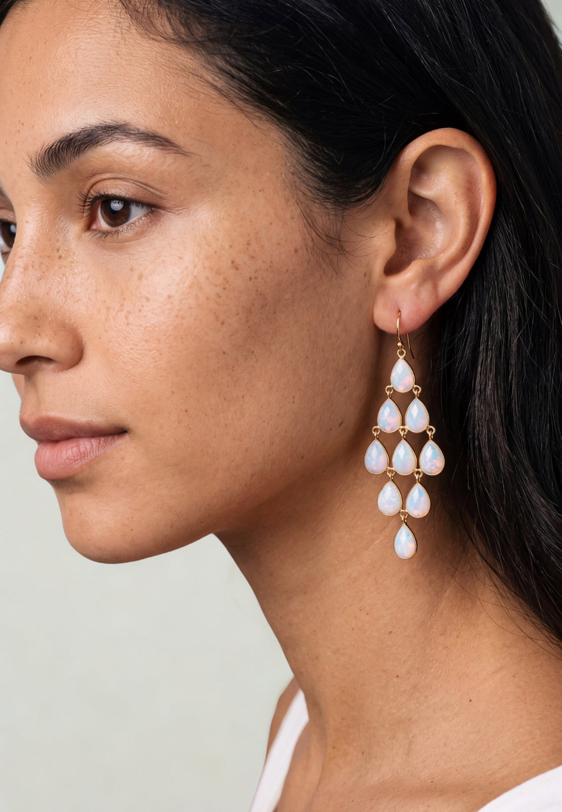 Gold-tone opal teardrop chandelier earrings, long dangling drops