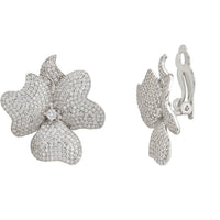 Large silver-tone flower clip-on earrings viewed from side, secure clip backs