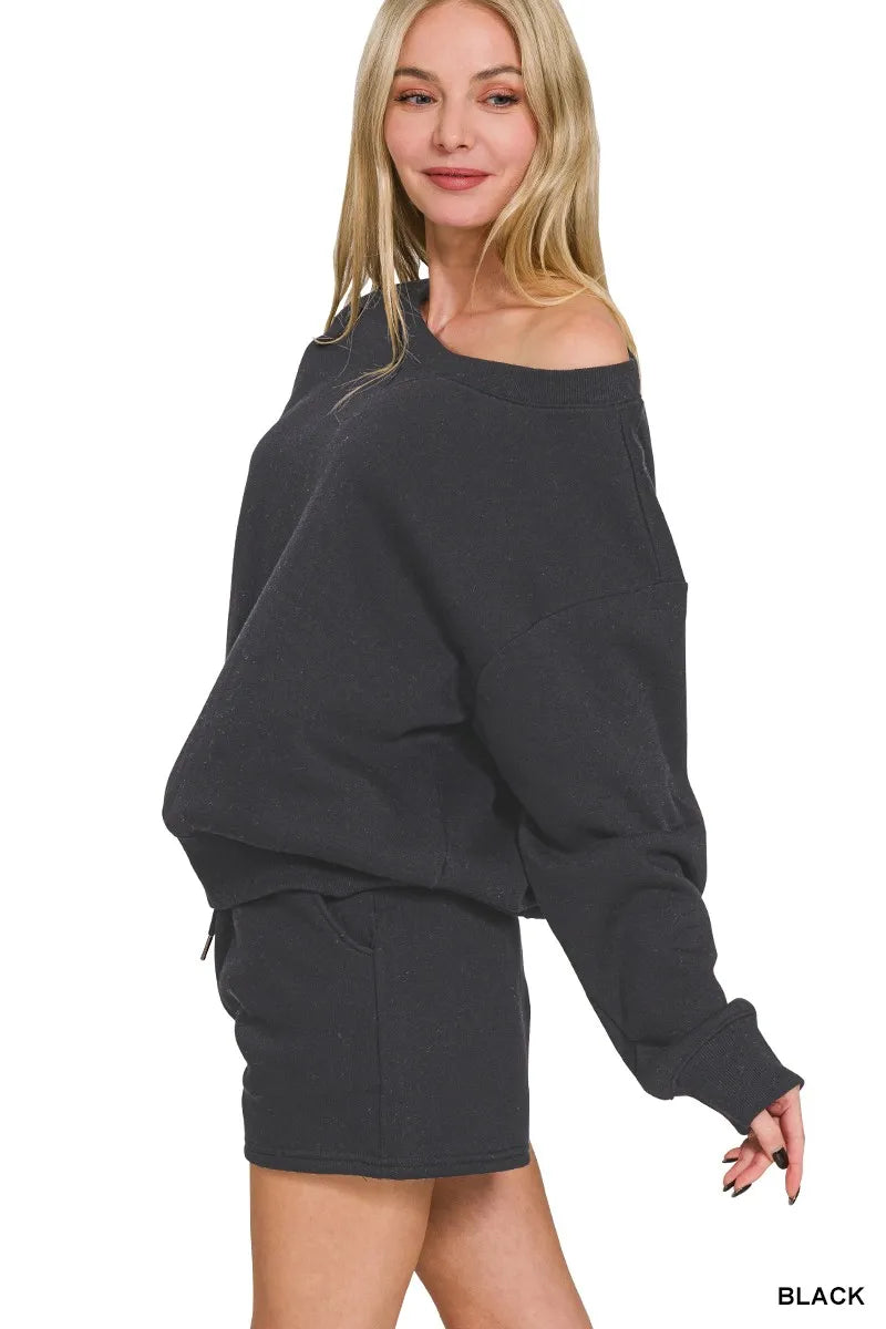 Black off-shoulder fleece sweatshirt with long sleeves and matching drawstring shorts