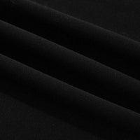 Black sweatshirt fabric close-up, smooth knit texture