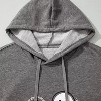 Dark gray hoodie hood and front ghost graphic detail with drawstrings and kangaroo pocket