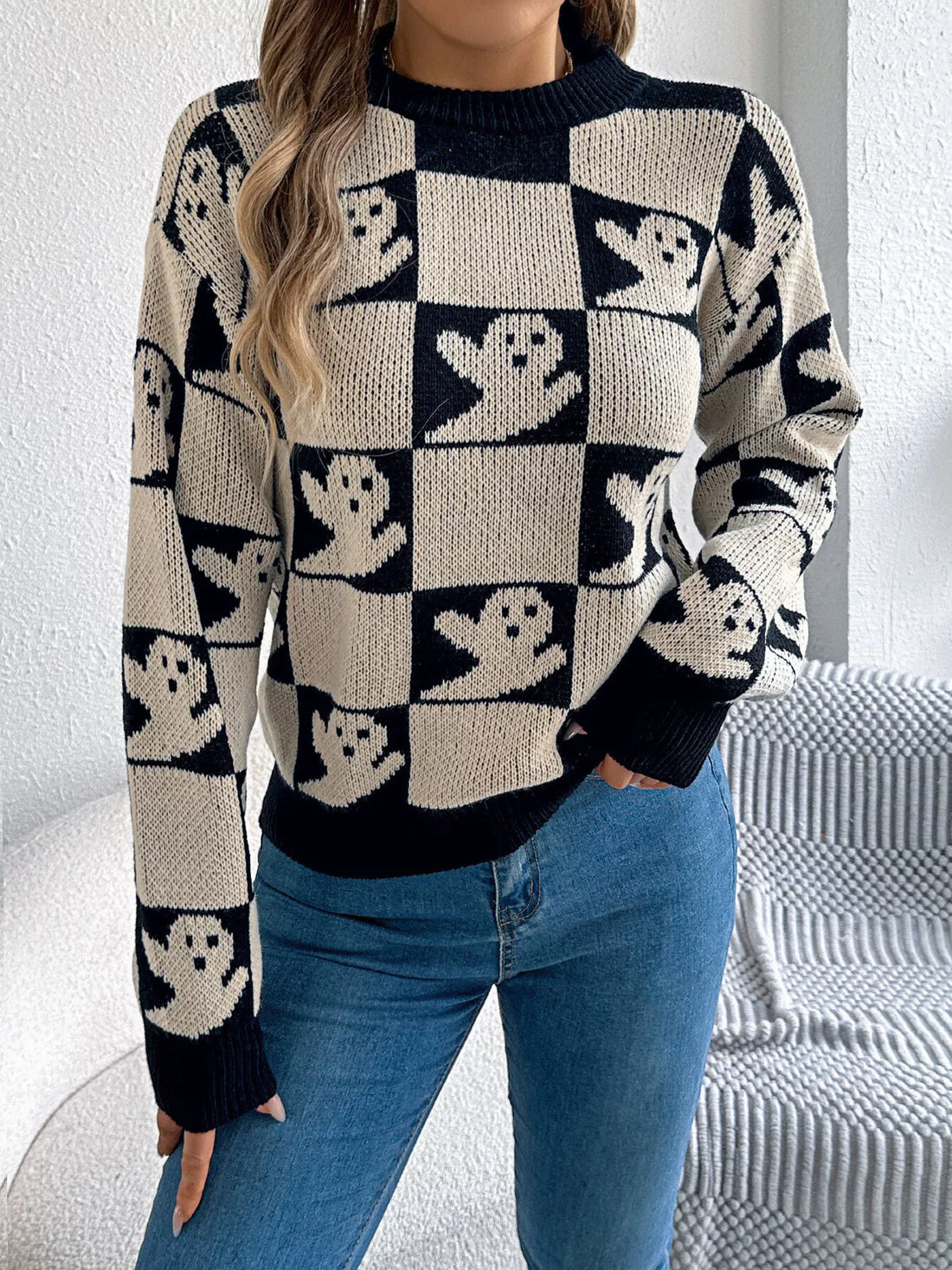 Ghost checkerboard knit sweater, black and cream with ribbed crew neck and cuffs