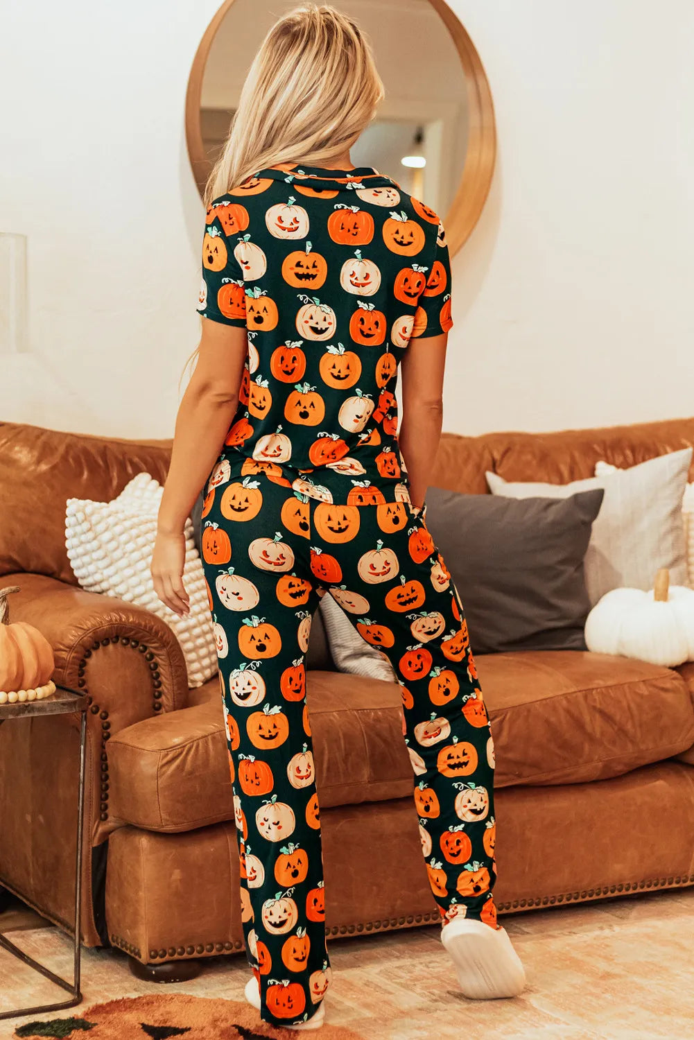 Dark green pumpkin-printed lounge set with short-sleeve top and full-length pants, back