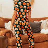 Dark green pumpkin-printed lounge set with short-sleeve top and full-length pants, back