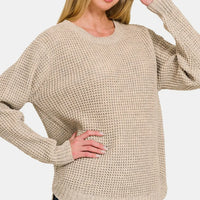Beige waffle knit long-sleeve sweater with crew neck and ribbed cuffs