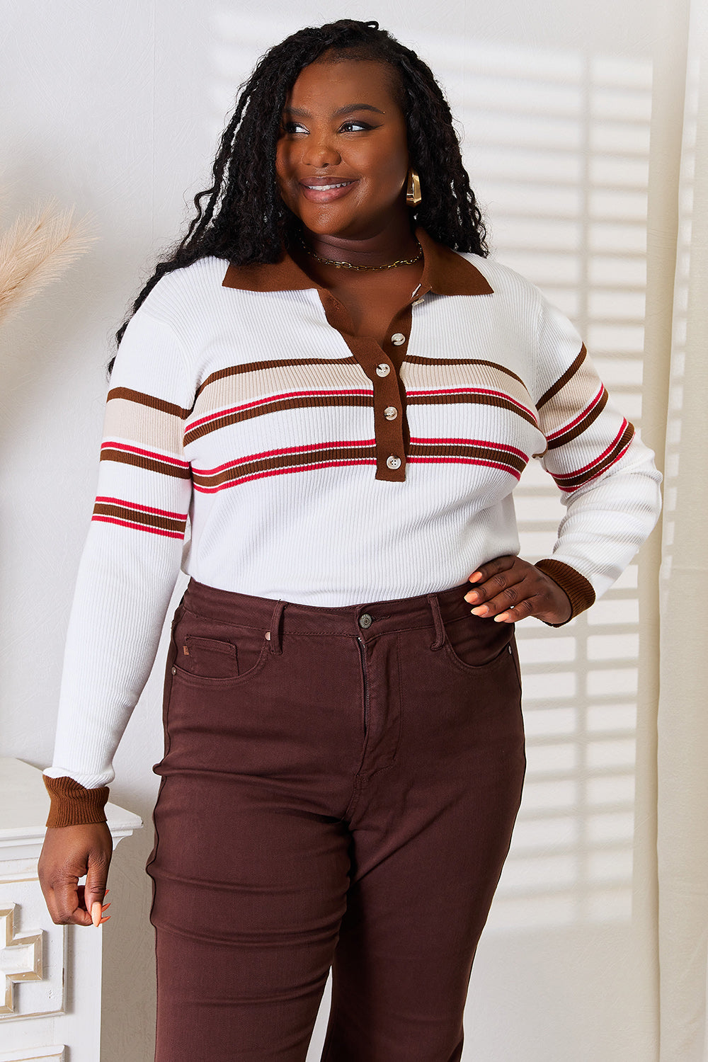 White striped collared rib-knit top with front button placket and ribbed cuffs