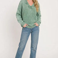 Green oversized V-neck washed sweater with ribbed cuffs and banded hem, long sleeves