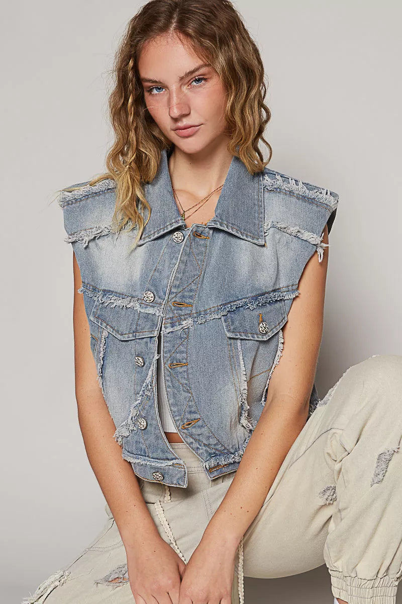 Light wash denim sleeveless vest with pointed collar and asymmetrical button front