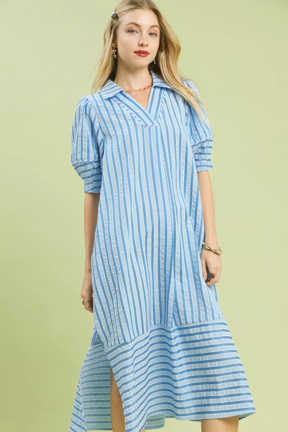 Blue-and-white striped midi dress with puff sleeves, V-neck.