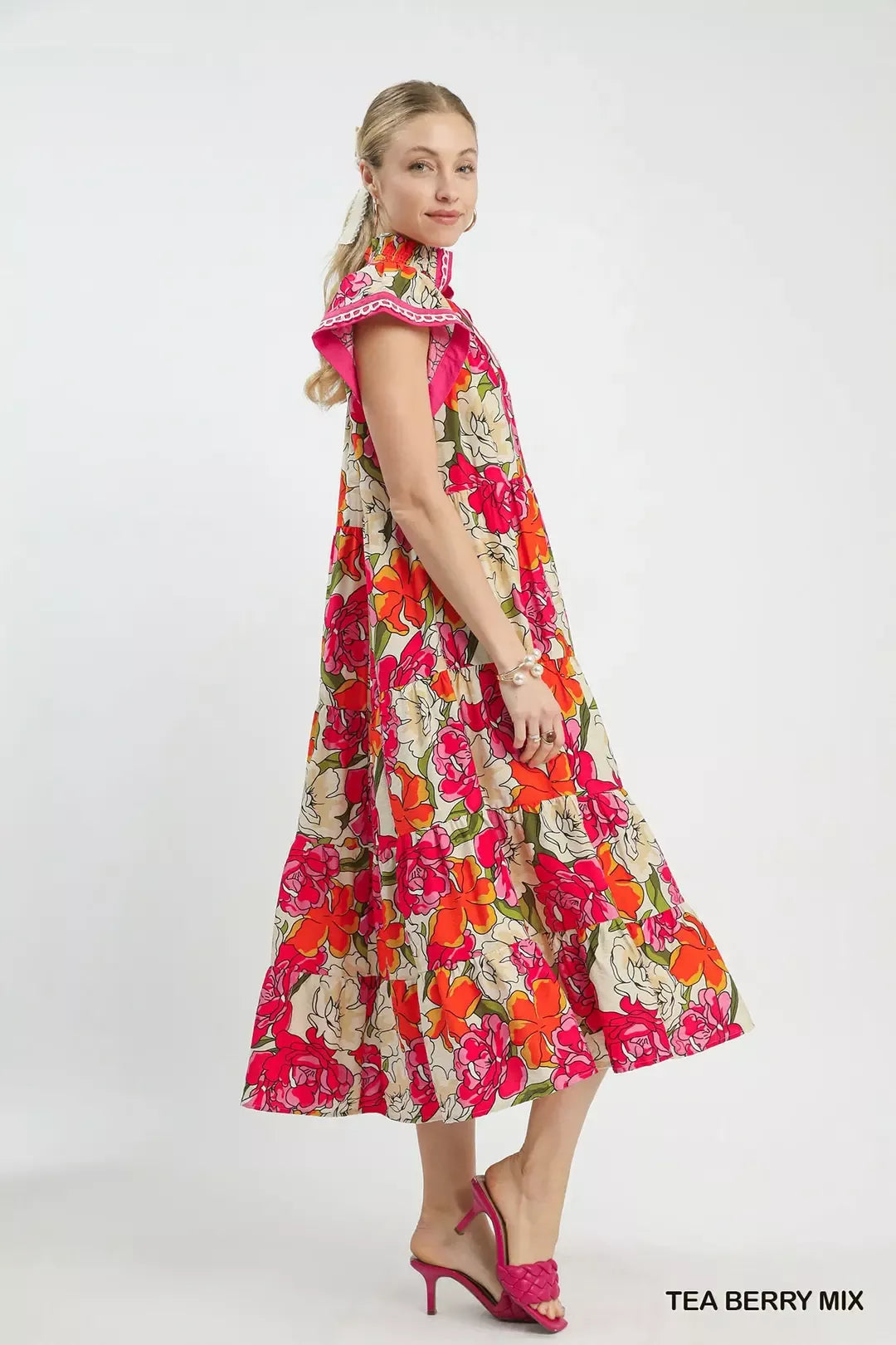 Floral tiered midi dress with cap sleeves and V-neck, side view in bright pink