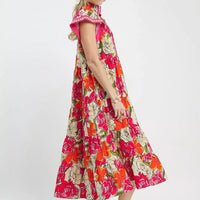Floral tiered midi dress with cap sleeves and V-neck, side view in bright pink