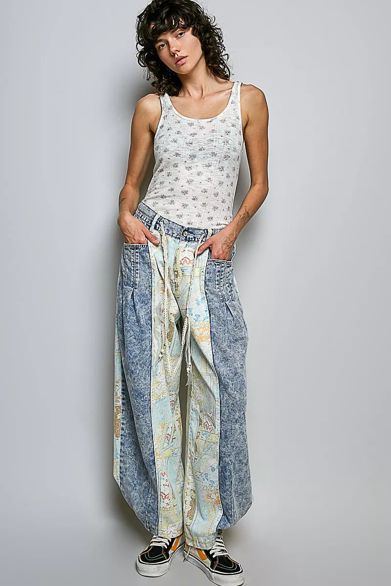 Ivory floral ribbed tank top, sleeveless scoop neck, full-body front view