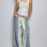 Ivory floral ribbed tank top, sleeveless scoop neck, full-body front view