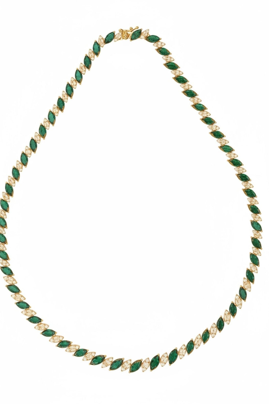 Gold-tone tennis necklace featuring emerald-green teardrop links, curved laid out