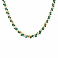Gold-tone tennis necklace with emerald-green teardrop stones in repeating rows