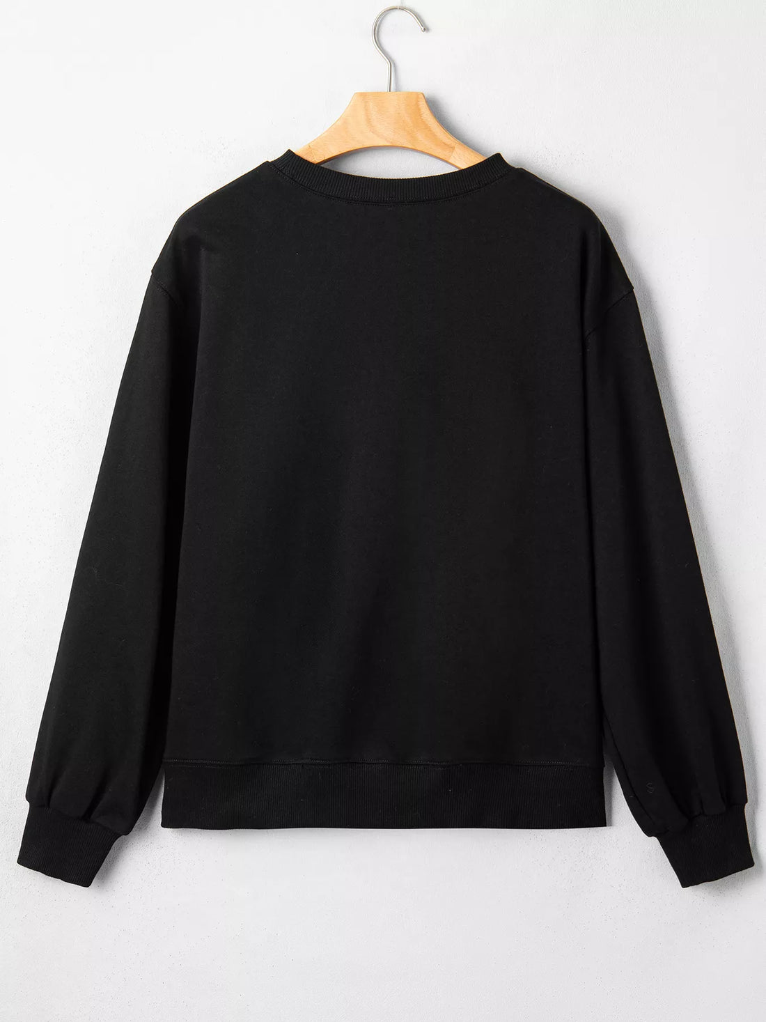 Black long-sleeve crewneck sweatshirt, plain back view