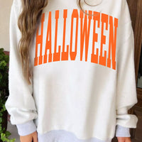 Light gray sweatshirt with large orange “HALLOWEEN” graphic, mock neck