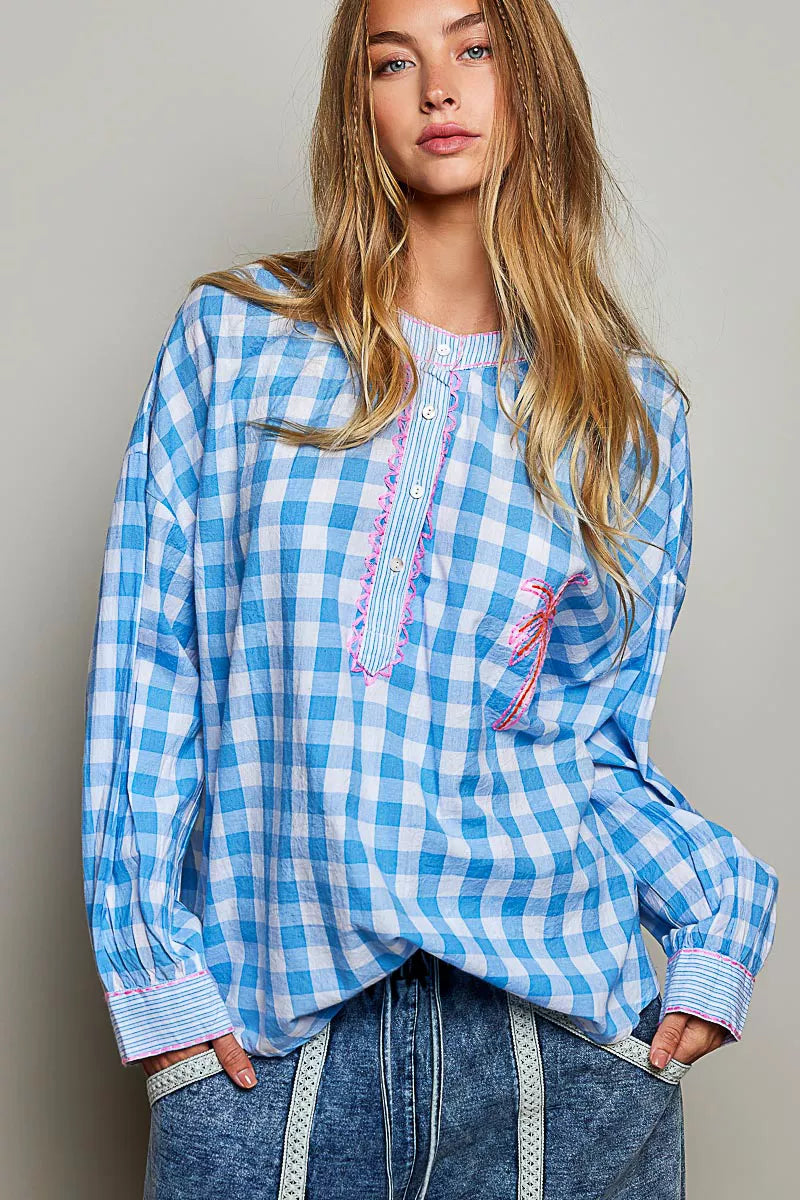 Blue gingham embroidered palm tree blouse with pink trim and long puff sleeves