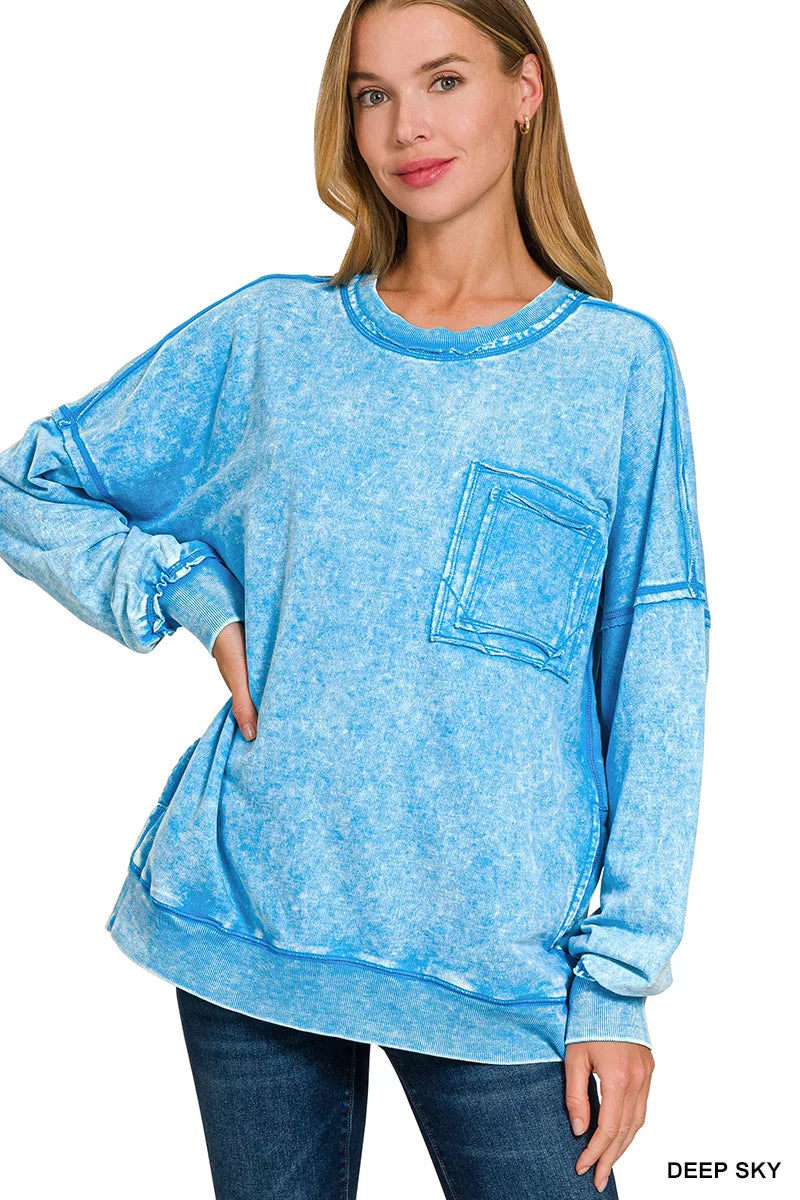 Deep sky blue acid-wash sweatshirt with front pocket and raw-edge cuffs