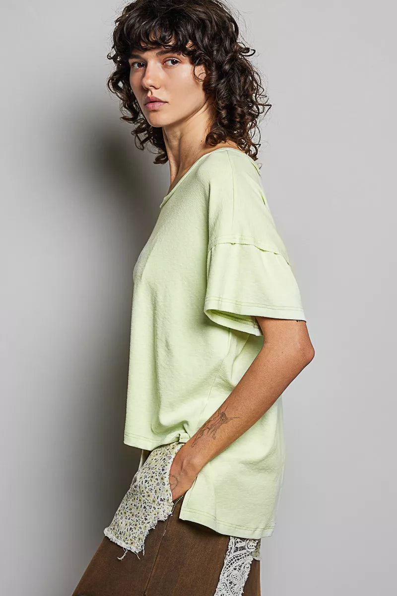 Mint green round-neck short-sleeve T-shirt, side view; high-low hem