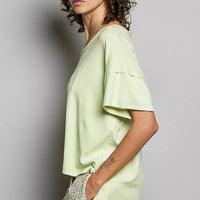 Mint green round-neck short-sleeve T-shirt, side view; high-low hem