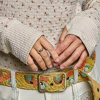 Ribbed knit top with mini floral print and textured long sleeves, hands detail