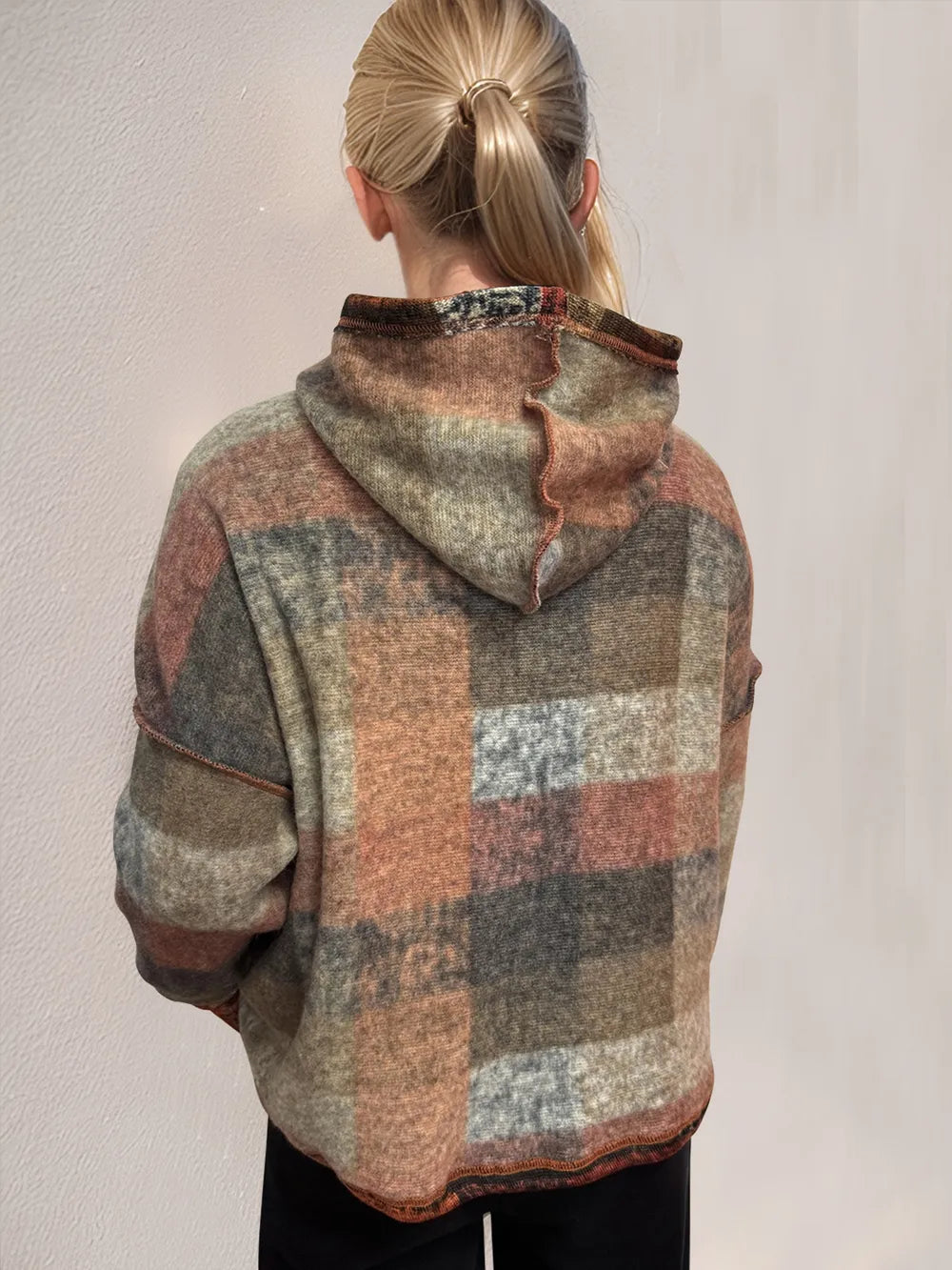 Plaid fleece hoodie with hood and half-zip, dropped shoulders, back view.