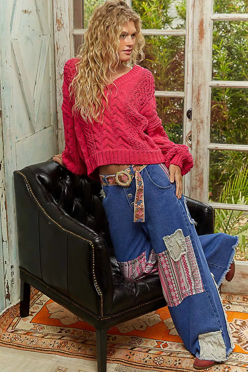 Fuchsia cable-knit cropped V-neck sweater, long sleeves with ribbed cuffs and hem