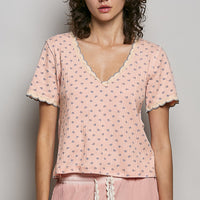 Soft pink floral V-neck T-shirt with lace-trimmed neckline and short sleeves