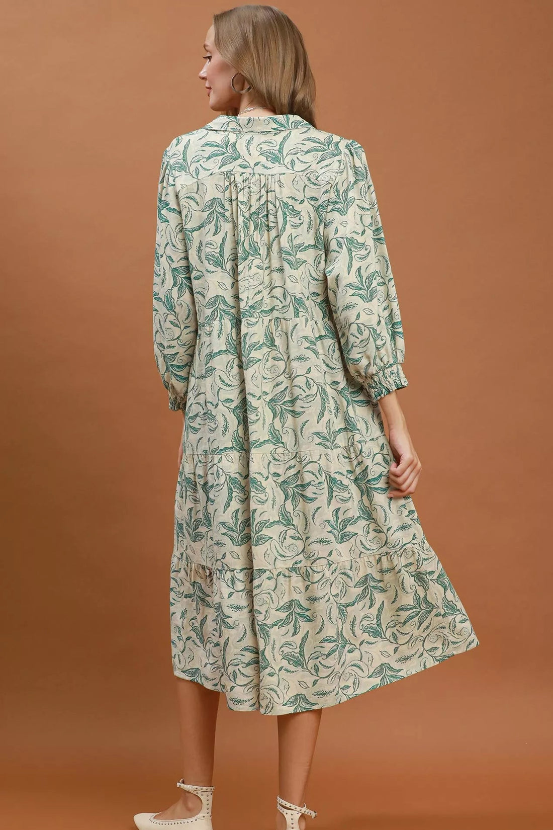 Green linen botanical print tiered midi dress with tiered back and long sleeves